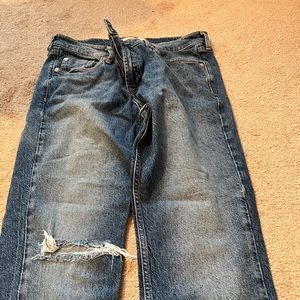 Free People open knee jeans